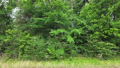 Tucked inside a desirable gated community, this beautifully - photo 2