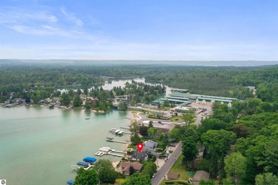 Welcome to your turnkey Torch Lake retreat, where luxury - photo 3