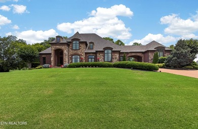 This beautiful stone-and-brick Tuscan-inspired home in the gated - photo 2