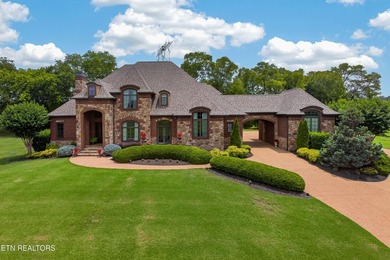 This beautiful stone-and-brick Tuscan-inspired home in the gated - photo 3