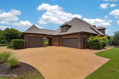 This beautiful stone-and-brick Tuscan-inspired home in the gated - photo 4
