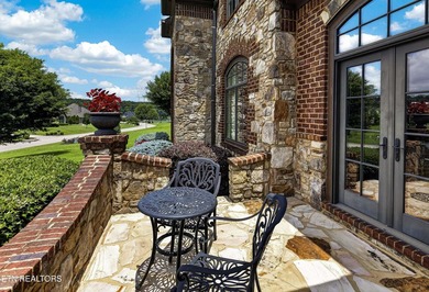 This beautiful stone-and-brick Tuscan-inspired home in the gated - photo 6