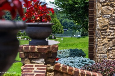 This beautiful stone-and-brick Tuscan-inspired home in the gated - photo 7