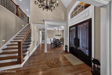 This beautiful stone-and-brick Tuscan-inspired home in the gated - photo 8