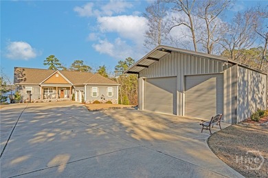 Enjoy lake living in the Soap Creek Community just off the main - photo 5