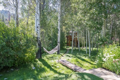 Tucked along a half-acre parcel bordering the Bigwood River - photo 32