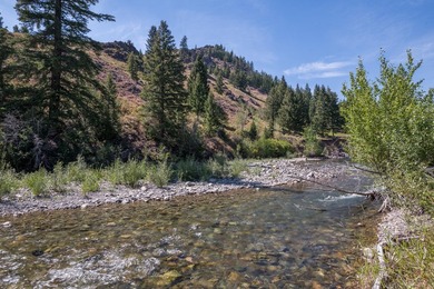 Tucked along a half-acre parcel bordering the Bigwood River - photo 35