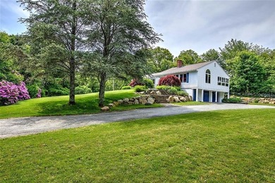 Perched atop a hillside along a winding drive, this one level - photo 12