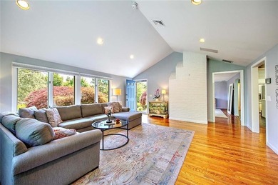 Perched atop a hillside along a winding drive, this one level - photo 17