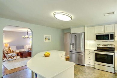 Perched atop a hillside along a winding drive, this one level - photo 20