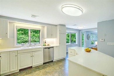 Perched atop a hillside along a winding drive, this one level - photo 21