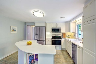 Perched atop a hillside along a winding drive, this one level - photo 24