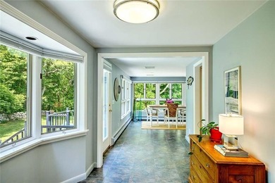 Perched atop a hillside along a winding drive, this one level - photo 25