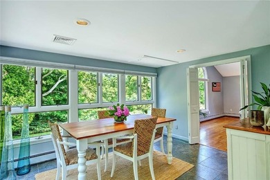 Perched atop a hillside along a winding drive, this one level - photo 26