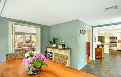 Perched atop a hillside along a winding drive, this one level - photo 27