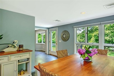 Perched atop a hillside along a winding drive, this one level - photo 28
