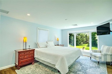 Perched atop a hillside along a winding drive, this one level - photo 31