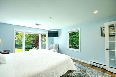 Perched atop a hillside along a winding drive, this one level - photo 32