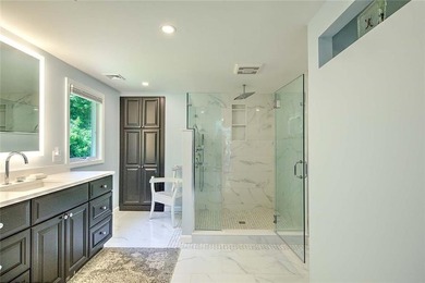 Perched atop a hillside along a winding drive, this one level - photo 33