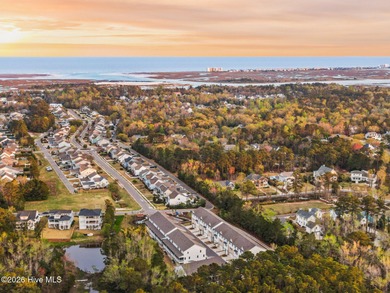 This beautifully appointed, premium end-unit townhome is like