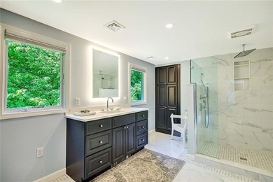Perched atop a hillside along a winding drive, this one level - photo 34