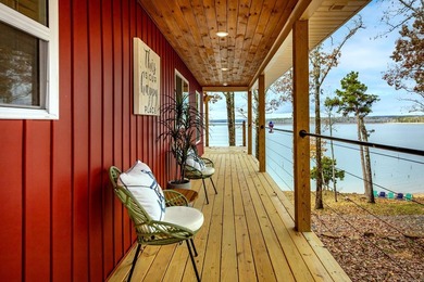 This incredible LAKE HOME, just a little over a year old, offers - photo 5