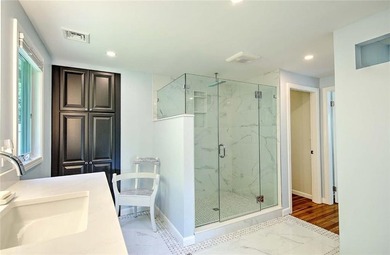 Perched atop a hillside along a winding drive, this one level - photo 35