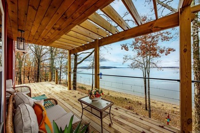 This incredible LAKE HOME, just a little over a year old, offers - photo 7