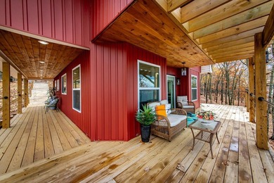This incredible LAKE HOME, just a little over a year old, offers - photo 8