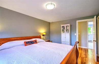 Perched atop a hillside along a winding drive, this one level - photo 38