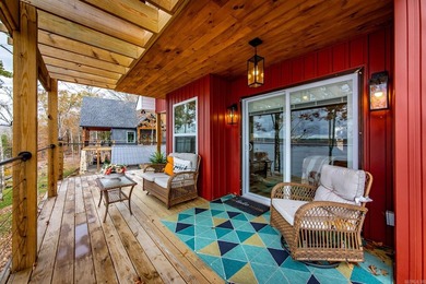 This incredible LAKE HOME, just a little over a year old, offers - photo 9