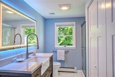 Perched atop a hillside along a winding drive, this one level - photo 41