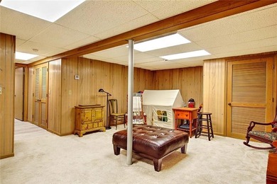 Perched atop a hillside along a winding drive, this one level - photo 43