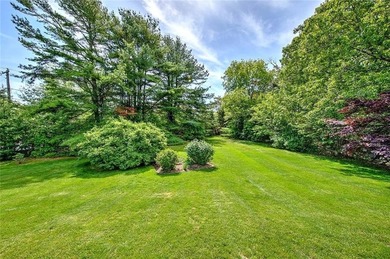Perched atop a hillside along a winding drive, this one level - photo 47