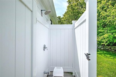 Perched atop a hillside along a winding drive, this one level - photo 49