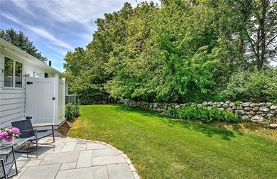 Perched atop a hillside along a winding drive, this one level - photo 50