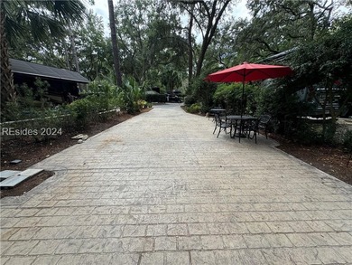 PERIMETER RV LOT 122 is a stamped concrete pad with a NEW - photo 2