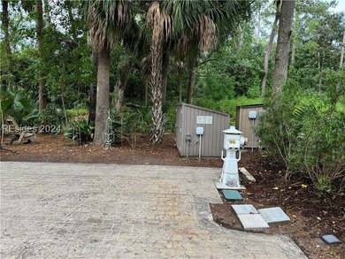 PERIMETER RV LOT 122 is a stamped concrete pad with a NEW - photo 6