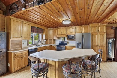 Step inside this rare beauty featuring vaulted ceilings, exposed - photo 12