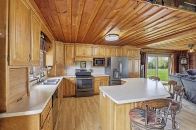 Step inside this rare beauty featuring vaulted ceilings, exposed - photo 13