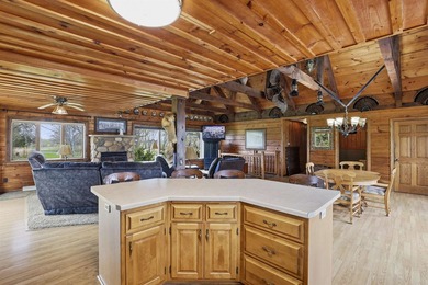 Step inside this rare beauty featuring vaulted ceilings, exposed - photo 14