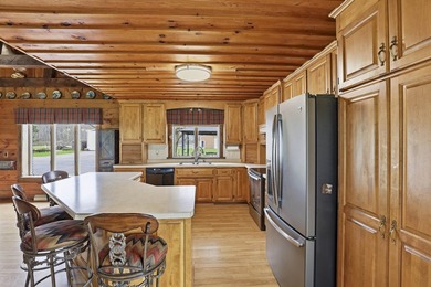 Step inside this rare beauty featuring vaulted ceilings, exposed - photo 15