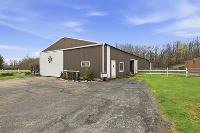 Step inside this rare beauty featuring vaulted ceilings, exposed - photo 31