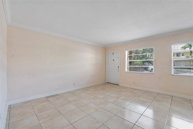 Discover a chic 2-bedroom, 1-bath corner unit condo with - photo 5
