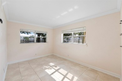 Discover a chic 2-bedroom, 1-bath corner unit condo with - photo 6