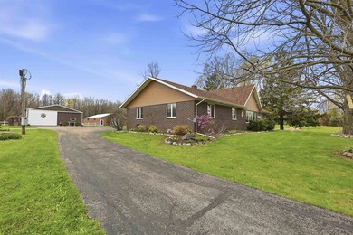 Step inside this rare beauty featuring vaulted ceilings, exposed - photo 37