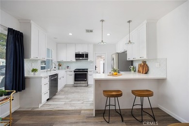 Welcome home to 3833 Ocana Avenue, a fully remodeled 3-bedroom - photo 6