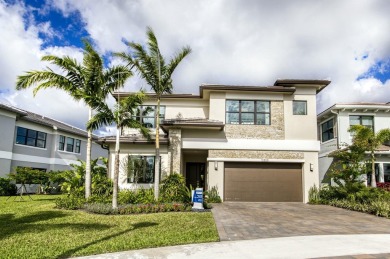 Lake Home For Sale in Palm Beach Gardens, Florida