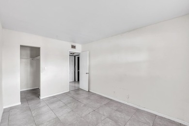 Discover a chic 2-bedroom, 1-bath corner unit condo with - photo 9