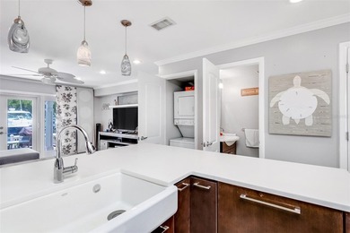 Beautifully updated and offered fully furnished, this - photo 11